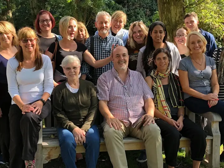 A retreat group photo in the gardens at The Friars