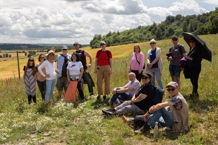 A retreat group pausing on a mindful walk through the Kent countryside